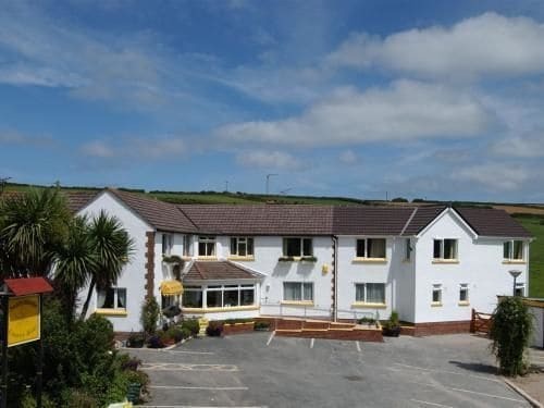 West Down米迪阳光旅馆公寓 外观 照片